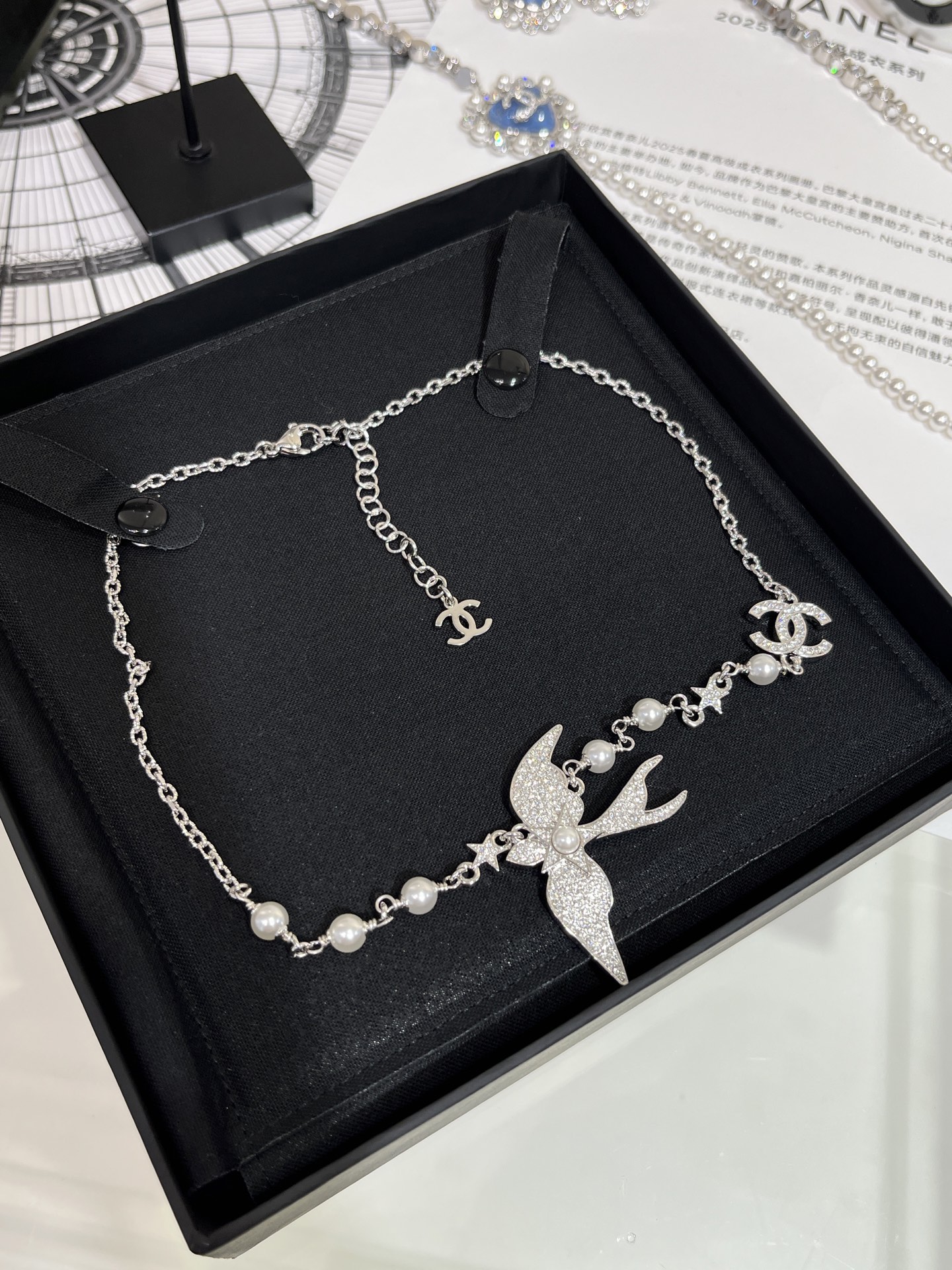 CHANEL 25S New Silver Bird-Inspired Double C Pearl Necklace