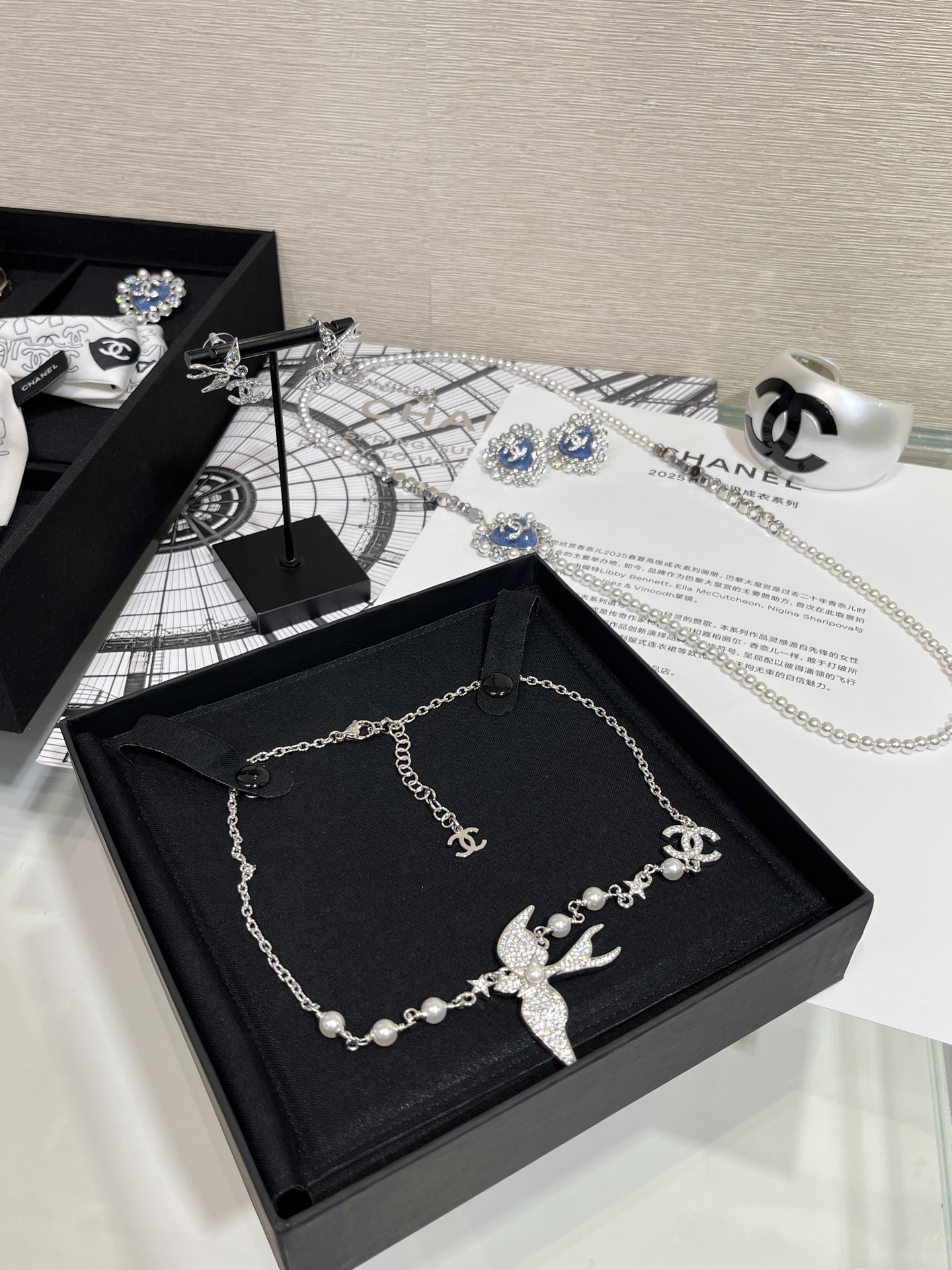 CHANEL 25S New Silver Bird-Inspired Double C Pearl Necklace