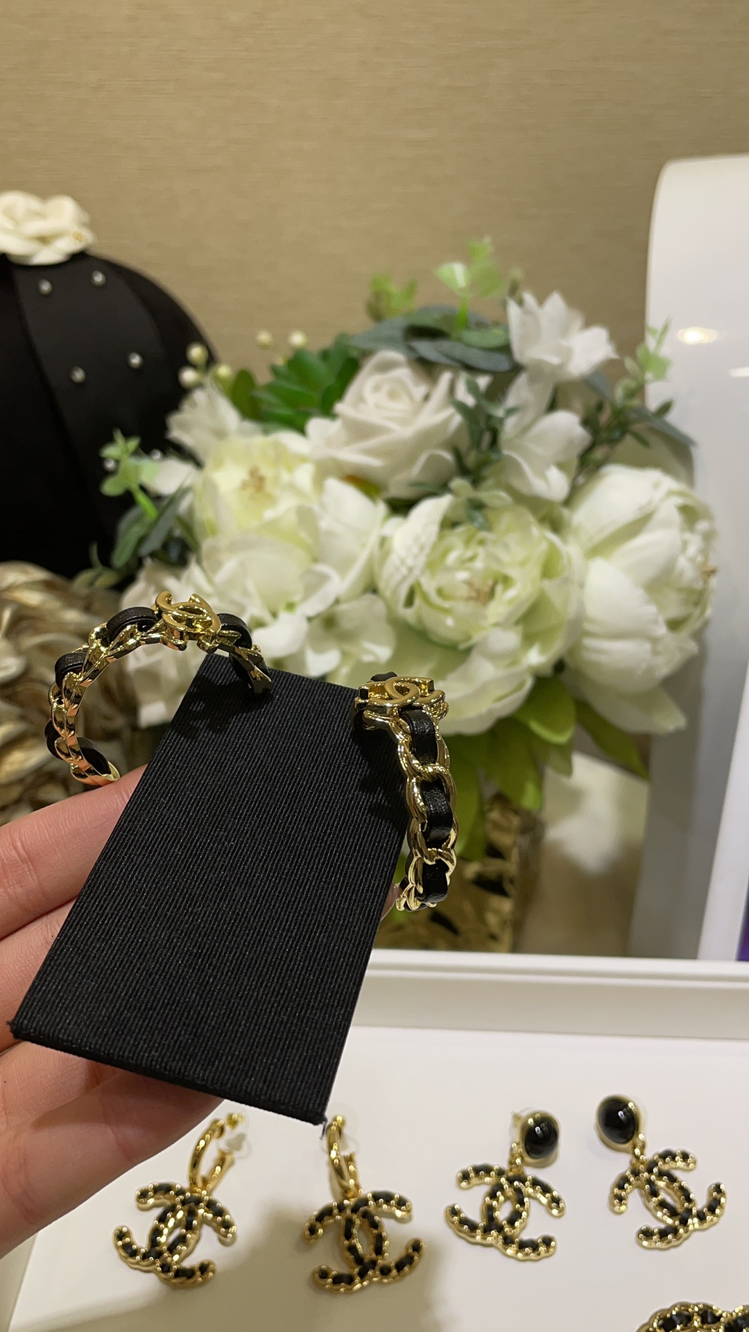 CHANEL 24K New Gold Double C Hoop Earrings with Leather-Woven Chain