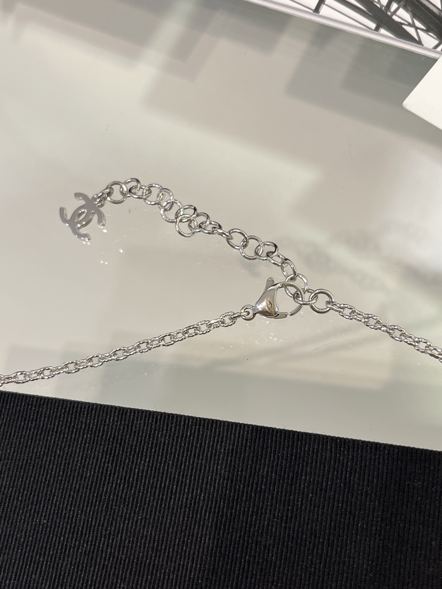 CHANEL 25S New Silver Bird-Inspired Double C Pearl Necklace